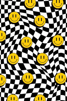 an abstract pattern with smiley faces on black and white checkered background