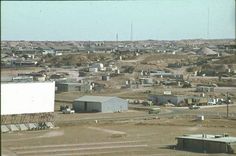 an aerial view of a small town in the desert