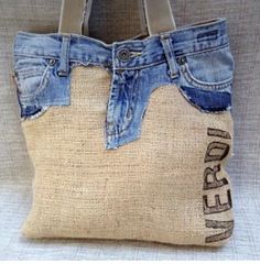 a handbag made out of old jeans with the word denim on it's side