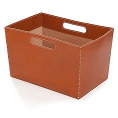 a brown leather storage box with handles