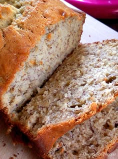 two slices of banana bread on a cutting board