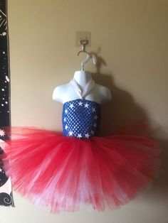 Beautiful Forth of July Tutu that any girl would love. The top is a Blue crochet top with soft felt, under it, across the front, so no skin is seen. The skirt is 4 layers for extra fullness, most tutus are only 3.The layers of tulle are red and white. Length of skirt varies. Measure from belly button to the length you want, then choose. Crochet top is stretchy so it fits most sizes. Fitted Summer Costume Tutu Dress, Fitted Tutu Dress For Summer Costume, Fitted Red Tutu Dress For Summer, Fitted Red Tutu Dress For Spring, Blue Fitted Tutu Dress For Costume, Blue Crochet Top, Pregnant 4th Of July Outfit, Stroudsburg Pa, Forth Of July