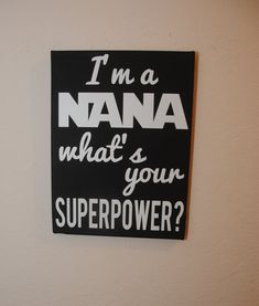 a black and white sign that says i'm a nana what's your super power?