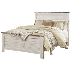 a bed with a wooden headboard and foot board