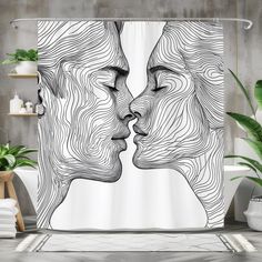 a shower curtain with two people kissing each other in front of a potted plant