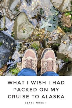 a person standing on rocks with the words what i wish i had packed on my cruise to alaska