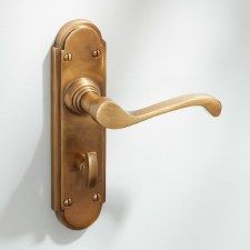 an image of a door handle on a white wall