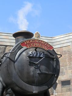 the hogwarts express train is on display outside