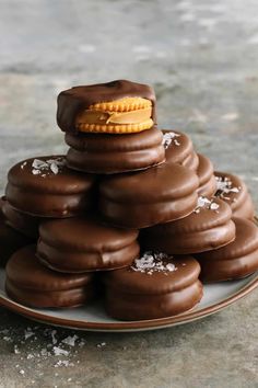 chocolate covered cookies stacked on top of each other