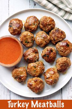 turkey meatballs on a plate with dipping sauce