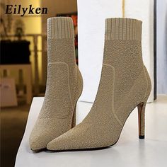 Overview: Unique design, stylish and beautiful. Good material, comfortable feet. A variety of colors, any choice. Specification: Upper material: wool Sole Material: Rubber Applicable gender: female Style: fashion Color: black, khaki, wine red Sizes: 35, 34, 36, 37, 38, 39, 40 Heel height: super high heel (above 8CM) Package Content: 1 pair x shoes Winter Boots Women Fashion, Simple Winter Fashion, Boots Fall Ankle, Designer Ankle Boots, High Heels For Women, Autumn Shoes Women, Cheap Ankle Boots, Large Size Womens Shoes, Stretch Boots