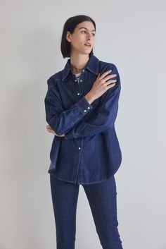 From laid-back weekends to casual outings, this tunic embodies effortless elegance. Revel in the sophistication of denim and embrace a look that effortlessly balances comfort and style. Oversized fit Collared Lightweight fabric Tunic style Fall Denim Blue Relaxed Fit Top, Relaxed Fit Washed Blue Denim Top, Relaxed Fit Washed Denim Top For Work, Dark Wash Denim Top With Relaxed Fit Long Sleeve, Fall Dark Wash Relaxed Fit Denim Top, Chic Relaxed Fit Medium Wash Denim Top, Classic Washed Denim Top For Everyday, Classic Washed Denim Top, Oversized Cotton Denim Top For Workwear