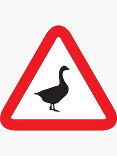 a red and white triangle sign with a duck on it's back side in front of a white background