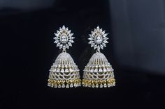 Most beautiful Gorgeous fully American Diamond embedded Jhumkas with Push. Back style.  This  stone are with  sparking shine gives a unique look Luxury Bollywood Style Pearl Drop Jhumkas, Luxury Bollywood Style American Diamond Jhumkas, Closed Setting Diamond Jhumkas, Luxury American Diamond Bridal Earrings For Diwali, Luxury Fusion Style Cutdana Jhumkas, Luxury Diamond Jhumkas As Gift, Bollywood Style Diamond Jhumkas, Diamond Jhumkas Indian, Diamond Jumkas