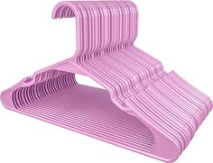 a pink plastic chair that is shaped like a letter j on top of another type of object