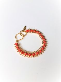 Unique braided colorful chain link bracelet for women, great for stacking for a perfect summer look. Material: metal is brass plated with either gold or white gold- 24k nickel free. Thread is waxed cotton. Dimentions: Length is 7 inch (18cm) , width is 0.4 inch (1 cm) - Arrives in labeled gift box, ready to give as a gift - Ships within 3 business days View my other bracelets: https://etsy.me/2xGTBBo Back to Home Page: https://www.etsy.com/il-en/shop/ZOZidesign?ref=hdr_shop_menu Unique Gold Bracelet, Unique Gold Jewelry, Gold Pinky Ring, Signet Rings Women, Colorful Bracelet, Orange Bracelet, Gold Link Bracelet, Gold Armband, Gold Link