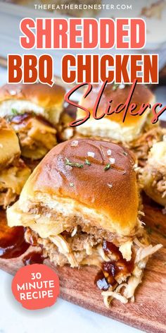 shredded bbq chicken sliders on a cutting board with text overlay that reads shredded bbq chicken sliders