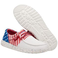 Style number: 122342143. American flag tri printed lightweight slip on shoe. Solid white rounded toe. Red and white stripes on mid section. Blue spangled print on heel. Embroidered logo on heel and tongue. Red stretch draw cord laces. Flex & fold technology. Cushioned leather insole. White rubber outsole. Blue Hey Dudes, 4th Of July Fits, Western Shoes, Hey Dude Shoes, Hype Clothing, Hey Dudes, Cord Lace, Slip On Shoe, Hey Dude