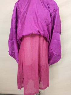 "Gorgeous vintage eighties/nineties Indian women's Kurta - Kurti tunic. Very pretty and quite unusual. Beautiful embroidered detail. Handmade, Indian. Exact fabric and cleaning recommendations unknown, probably rayon could be silk. Pull over the head, no zipper. Two layers, top is fairly opaque and inner cotton layer fairly sheer. Beautiful bright deep magenta pink color, gold edging. Green highlights on the bodice detail. Lg equivalent Western sizing - please go by the actual measurements. Exce Long Sleeve Festival Tunic, Free Size Long Sleeve Tunic For Festival, Festival Long Sleeve Free Size Tunic, Traditional Tunic For Spring, Traditional Free Size Tunic For Spring, Deep Magenta, Green Highlights, Indian Dress, Dress Handmade