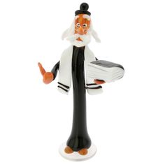 a black and white figurine with an orange nose holding a briefcase in his hand