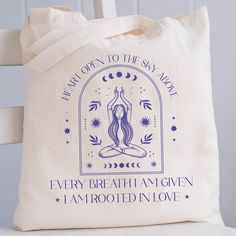 Boho Tote Bag, Spiritual Gifts For Women, Yoga Tote Bag, Gift For Her, Gift For Sister, Unique Gifts, Unique Tote Bag, Tote Bag Aesthetic Say goodbye to plastic, and bag your goodies in this organic cotton tote bag. There's more than enough room for groceries, books, and anything in between. * 100% certified organic cotton 3/1 twill * Fabric weight: 8 oz/yd² (272 g/m²) * Dimensions: 16″ × 14 ½″ × 5″ (40.6 cm × 35.6 cm × 12.7 cm) * Weight limit: 30 lbs (13.6 kg) * 1″ (2.5 cm) wide dual straps, 24 Eco-friendly Letter Print Shoulder Bag Gift, Yoga Tote Bag, Yoga Tote, Boho Tote Bag, Bag Illustration, Unique Tote Bag, Tote Bag Aesthetic, Boho Tote, Bag Aesthetic