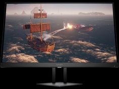 a computer monitor with an image of a pirate ship in the ocean on it's screen