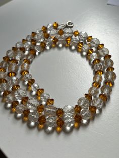 Long29 inch faceted crystal bead necklace larger clear beads and smaller yellow/ amber colour beads Clear Beads, Crystal Bead Necklace, Amber Color, Beaded Necklaces, Faceted Crystal, Bead Necklace, Crystal Beads, Necklace Etsy, Beauty Book