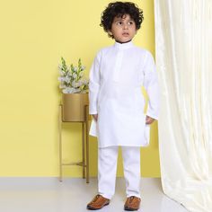 **Specifications : Please visit our brand store** https://www.etsy.com/in-en/shop/AJDezines?ref=seller-platform-mcnav Specially handcrafted clothing for the perfect look and comfort for the festive season Fabric Detail : Kurta - Cotton, Pyjama - Cotton Sales Package : - 1 Kurta, 1 Pyjama Kurta Feature - Cotton, Solid, Roll Up Sleeve, Round Neck, Straight Hem, Button Closure Pyjama Feature - Solid Pattern and Partial Elasticated Slip On Closure. Occasion: The perfect set for your young boy for sp White Dabka Sets For Diwali, White Cotton Pant Set For Eid, Cotton Long Sleeve Sets For Puja, Traditional White Pant Set For Diwali, White Cotton Sets For Puja, White Long Sleeve Sets For Navratri, White Long Sleeve Set For Diwali, White Long Sleeve Sets For Diwali, White Straight Kurta Set For Puja