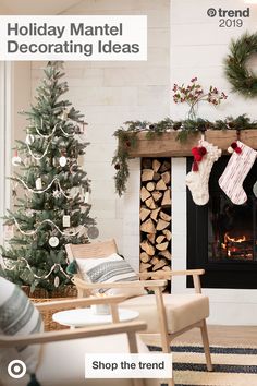 christmas stockings hanging from the fireplace in a living room with a tree and fire place