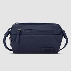 This Travelon Bag Is New With Tags! Color: Navy Blue Heather Size: 8.5" X 5.25" X 2" Material: Polyester Weight (Ibs): 0.55 Strap Length: 49" Strap Drop Length: 13" - 26" Volume (Cubic Liter): 1 The Metro Convertible Small Crossbody Shows Off Its City Sensibility And Creates A Parallel Between Utility And Design For A Modern Minimalist Aesthetic With Clean Lines, Lightweight-Tactile Materials, And Elevateo Finishes. Water-Resistant, Built-In Security, And Quality Workmanship Provide You With A B Modern Blue Belt Bag For Travel, Blue Crossbody Bag With Anti-theft Pocket, Modern Blue Belt Bag For Everyday Use, Navy Crossbody Travel Bag, Blue Rectangular Bag With Anti-theft Pocket, Blue Rectangular Shoulder Bag With Anti-theft Pocket, Navy Travel Pouch Bag, On-the-go Blue Bag With Anti-theft Pocket, Versatile Blue Shoulder Bag With Anti-theft Pocket