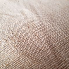 closeup of the texture of a beige fabric