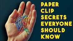 a hand holding up several paper clips with the words paper clip secrets everyone should know