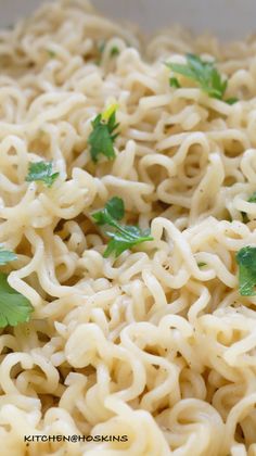 noodles with cilantro and parsley are ready to be cooked in the oven