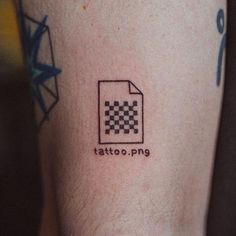 a tattoo with a checkerboard pattern on it