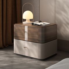 a nightstand with a lamp on top of it next to a bed in a room