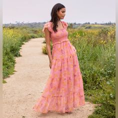 This Enchanting Maxi Dress Is Your Perfect Escape For The Summer! Look Utterly Feminine And Summer-Ready With Its Floral Pattern And Whimsical Design. Vacation-Ready And Romantic All In One - This Dreamy Dress Will Have You Ready To Jet Off And Explore! Floral Square Neck Maxi Dress Smocked Bodice, Elastic Square Neck Cap Sleeves Or Wear Off The Shoulder Fully Lined Davi & Dani By Pinkblush Shelf Pull (Shelf Pulls Are Excess Goods That Have Been Displayed For Sale In A Store Or Online But Have N Pink Smocked Maxi Dress For Spring, Pink Maxi Length Smocked Dress For Spring, Pink Feminine Maxi Dress With Smocked Bodice, Pink Flowy Maxi Dress With Smocked Bodice, Flowy Pink Maxi Dress With Smocked Bodice, Pink Smocked Bodice Maxi Dress For Garden Party, Pink Smocked Bodice Maxi Dress For Daywear, Pink Maxi Dress With Smocked Bodice For Daywear, Pink Maxi Dress With Smocked Back For Garden Party