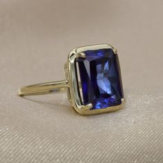 An Absolutely gorgeous Blue Sapphire Gold ring. The Prong setting is the perfect way to let this stone shine with natural sunlight. The color is simply amazing as well as the clarity, This is a Grade AAA corundum Gemstone.Handmade by artist in solid gold with an utmost attention to details.Beautifully finished with Each  gemstones handpicked and inspected for the best color and depth.Get this ring today and enjoy it forever!Ring Features:•Made to Order, perfectly finished, Fast shipping fully in