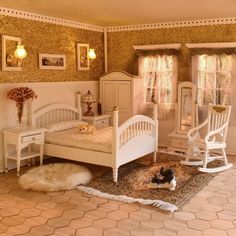 a doll house bedroom with white furniture and accessories