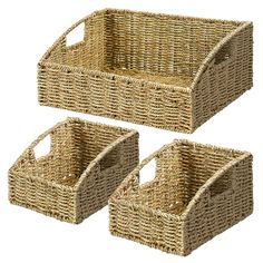 three wicker baskets with handles on each side and two smaller ones in the middle