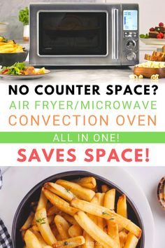 a microwave oven sitting on top of a counter next to french fries