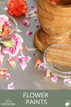 flowers are spilled out of glass bowls on a table with the words, flower paints