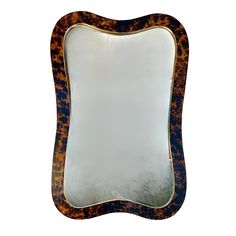 an animal print mirror on a white background