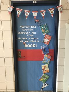 the door to dr seuss's classroom is decorated with books and pennants