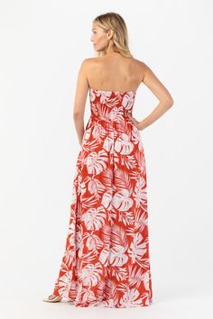 Stroll along tree-lined lanes, with a your favorite beverage, and the Emilia Maxi Dress guiding your adventure. Featuring a simple strapless sweetheart neckline and dual slits, this maxi dress is sure to wow. Details: 100% Rayon Hand wash cold & lay flat to dry Features: Unlined, Smocked sweetheart bodice, dual slits, Floor length skirt Tropical Red Floral Print Maxi Dress, Tropical Print Strapless Dress, Summer Strapless Orange Maxi Dress, Tropical Maxi Dress With Vibrant Print And V-neck, Tropical Multicolor Midi-length Maxi Dress, Jumpsuit For Kids, Swimwear Store, Strapless Sweetheart Neckline, Floor Length Skirt