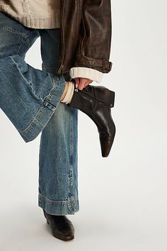 You’re effortlessly cool in these easy slip-on ankle boots, featuring a chic snip toe and low, slanted block heel, all in a smooth vegan leather for a modern take on a timeless style. **Features:** Ankle length, vegan leather uppers, snip toe, inner ankle zipper, low block heel **Why We | Easy Does It Vegan Ankle Boots by FP Collection at Free People in Brown, Size: US 8.5 Western Ankle Boots Outfit, Short Heeled Boots, Flat Leather Ankle Boots, Free People Booties, Casual Leather Boots, Ankle Cowboy Boots, Fall Winter Shoes, Boots Outfit Ankle, Easy Does It