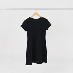 Finally, a t-shirt dress that is comfortable and flattering. Made from lightweight, machine washable, 100% organic cotton. Black T Shirt Dress, Shop Outfits, Happy Hours, Minimalist Wardrobe, Dress Sewing, Cool Jackets, Field Jacket, Black T Shirt, Simple Dresses