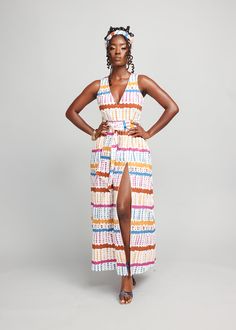 Style#1126WNA The Tinashe Women's Maxi Dress, showcasing the vivid White Nautical Adire print featuring pops of blue, orange, and yellow; masterfully blends the beauty of African-inspired motifs with the grace of a flowing silhouette. Ideal for standing out at summer gatherings, it's designed to enchant and allure, making sure all eyes are on you. Shop the matching items. *The dress you receive may vary slightly from the product image. It is the same fabric but may be cut in a different section African Print Maxi Dress, Maxi Dress White, Summer Gathering, Women Maxi, All Eyes, The Grace, African Inspired, White Maxi Dresses, Printed Maxi