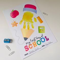 a poster with school supplies on top of it next to markers and pencils,