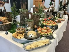 an assortment of snacks on a buffet table