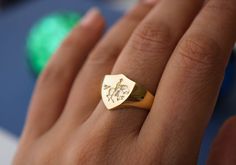 "solid gold shield signet ring engraved with Napoleon Crossing the Alps ♡ the ring has solid back. deep and detailed engraving very delicately handcrafted unisex - looks super cool on both women & men side or inside engravings cost 12 USD for both sides. please contact us if you request side engravins or simply go back to our shop and purchase the \"Side or inside engraving fee\" listing. available in 3 face sizes: medium - 12x14 mm large - 14x16 mm xlarge - 16x18 please send your image to b Napoleon Crossing The Alps, Sovereign Ring, Mens Gold Signet Rings, 14k Gold Signet Ring, Gold Sovereign, Family Crest Rings, Gold Shield, Custom Signet Ring, Graduation Rings